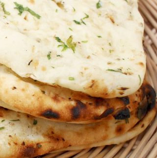 This naan is soft and pillowy, with just the right degree of chewiness. If you love the naan you have in Indian restaurants, you'll adore this! | yumsome.com