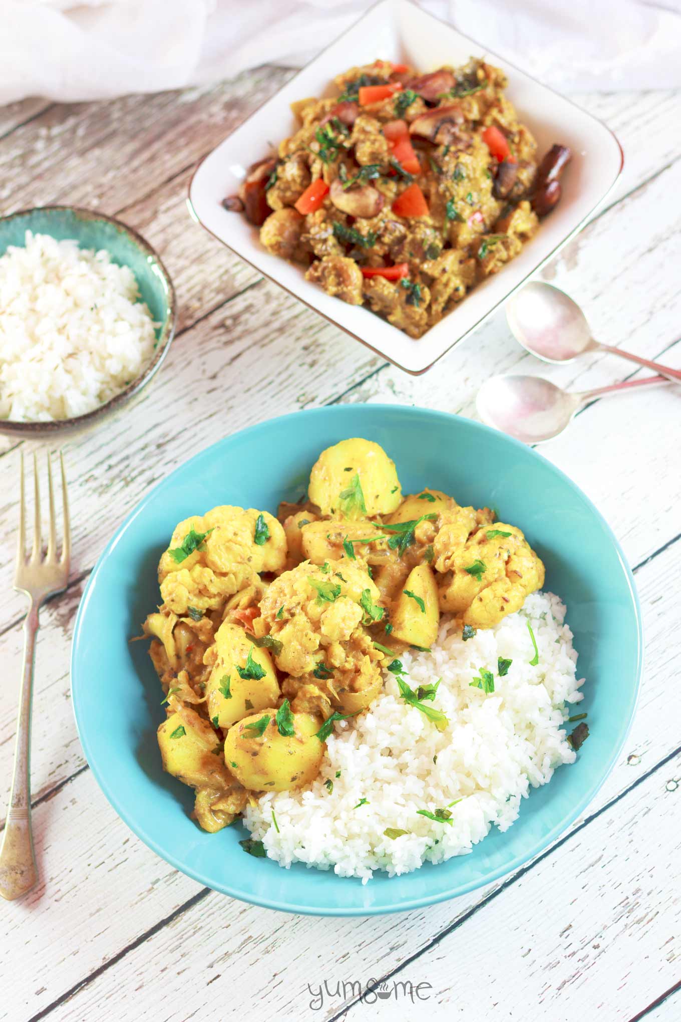This simple vegan aloo gobi masala is a delicious mildly-spiced north Indian dish, made with potato and cauliflower, and can be served dry, or with a gravy. | yumsome.com
