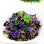 A white bowl containing vegan red cabbage stuffing.