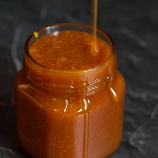 My simple, 4-ingredient vegan salted caramel sauce is the perfect accompaniment to ice cream, puddings, sundaes, cakes, cookies, and crumbles. | yumsome.com