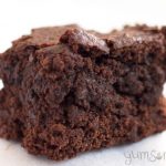 A vegan brownie on a white background.