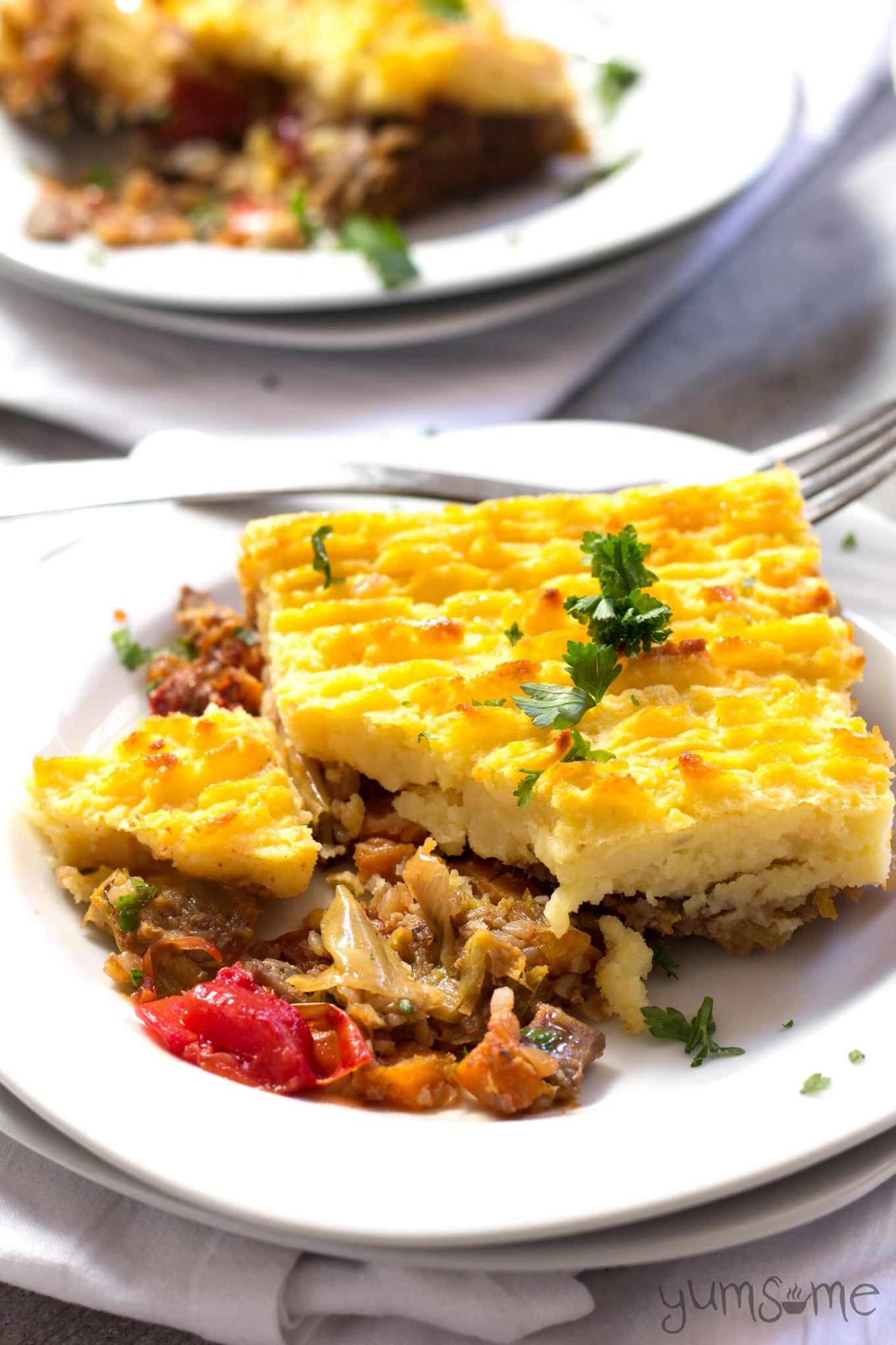 Hearty vegetables and nourishing buckwheat, topped with a layer of crisped creamy mashed potato, make my vegan mushroom and buckwheat shepherd’s pie a deliciously comforting, filling, and very frugal autumn dish. It’s so delicious, you won’t miss the meat! | yumsome.com