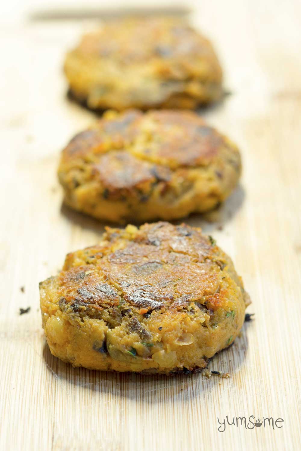 Tahini and squash add moistness and flavour to these chickpea burgers, while the polenta gives them a lovely, crispy coating. | yumsome.com