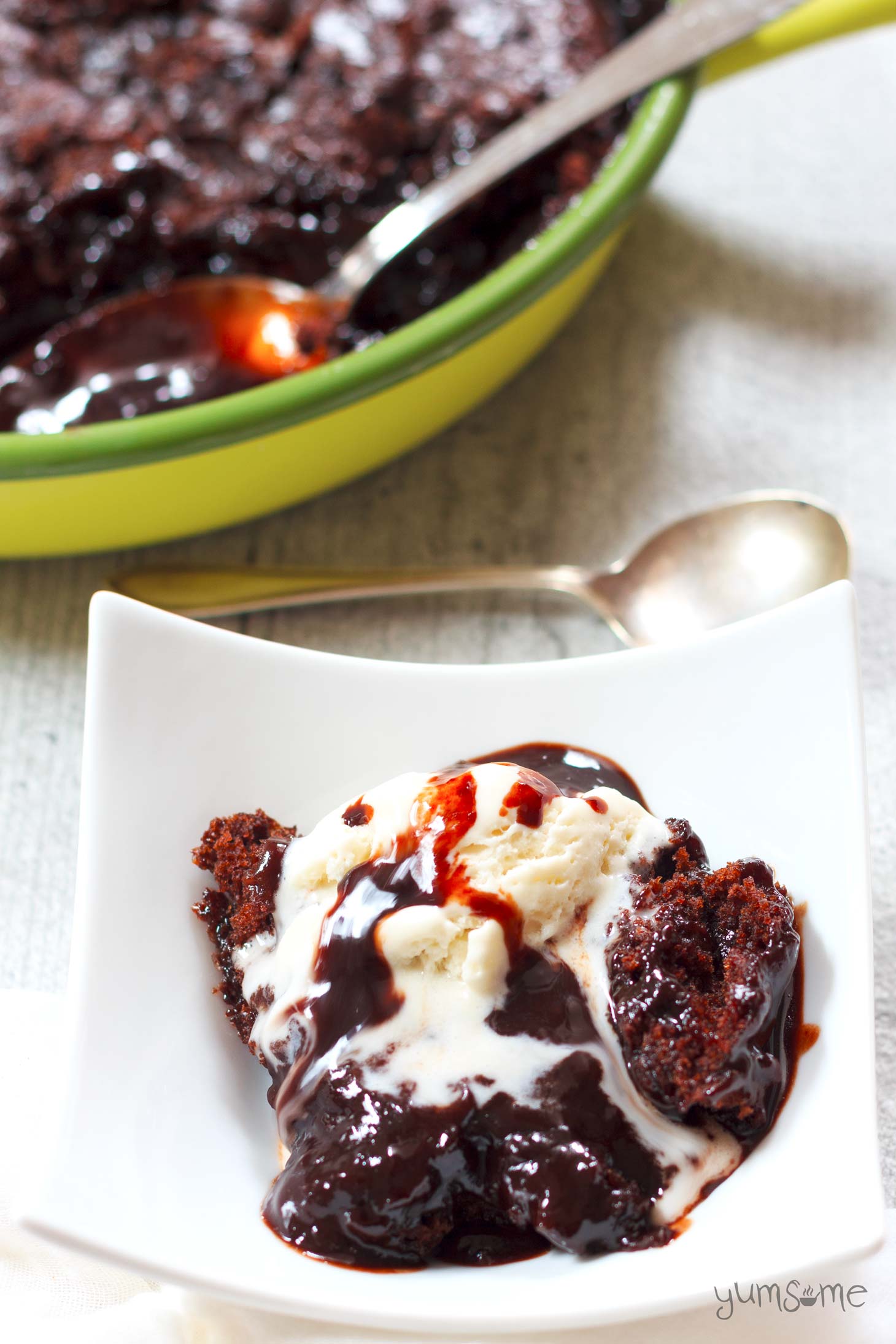 Vegan self-saucing chocolate pudding has a lovely moist, cakey, brownie-like, top part, with a rich velvety sauce hidden underneath. | yumsome.com