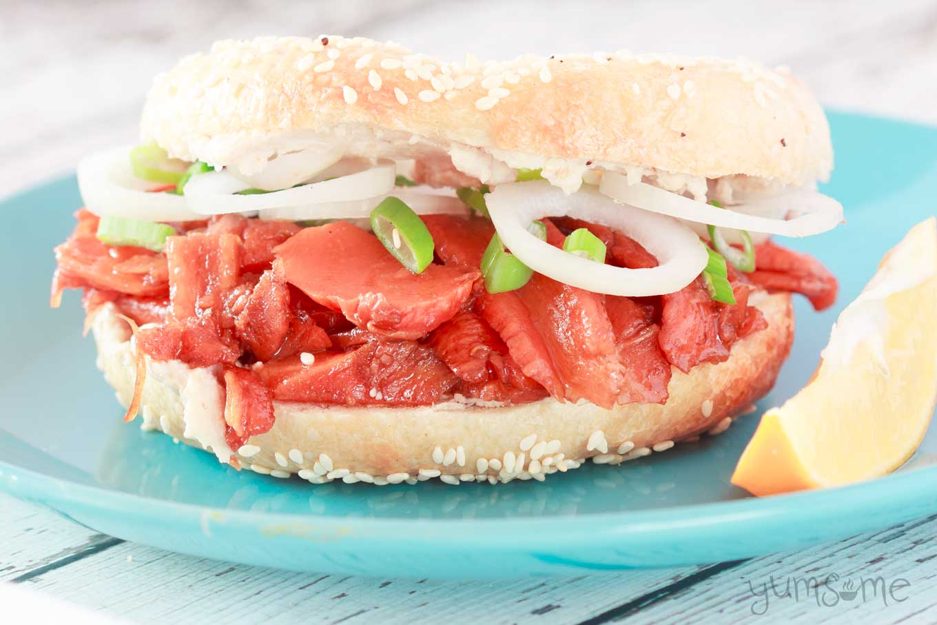 closeup of a vegan lox and cream cheese bagel | yumsome.com