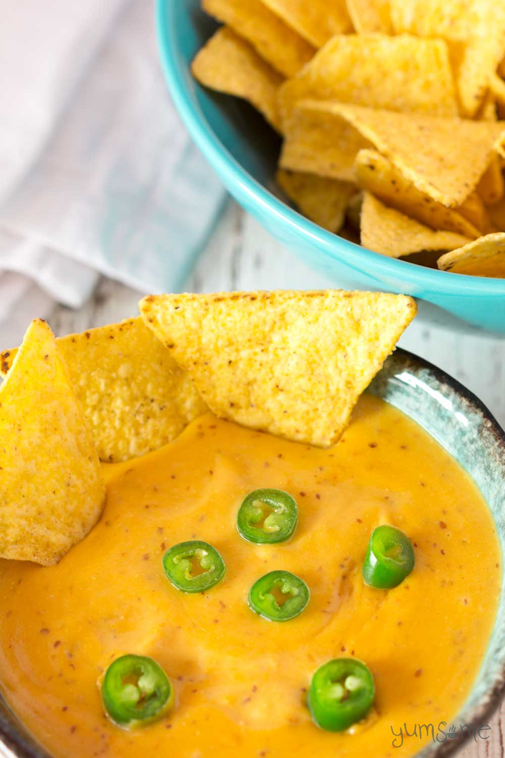 Fantastic with so many dishes, and made with just a handful of staple ingredients, my vegan nacho cheese is creamy and cheesy, with a bit of a spicy kick. | yumsome.com