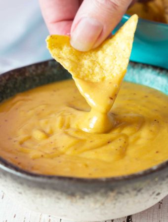 Fantastic with so many dishes, and made with just a handful of staple ingredients, my vegan nacho cheese is creamy and cheesy, with a bit of a spicy kick. | yumsome.com