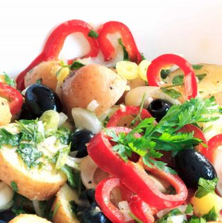 Bursting with flavour, and full of delicious fresh vegetables, this loaded spring salad is nourishing, filling, and super-delicious! | yumsome.com