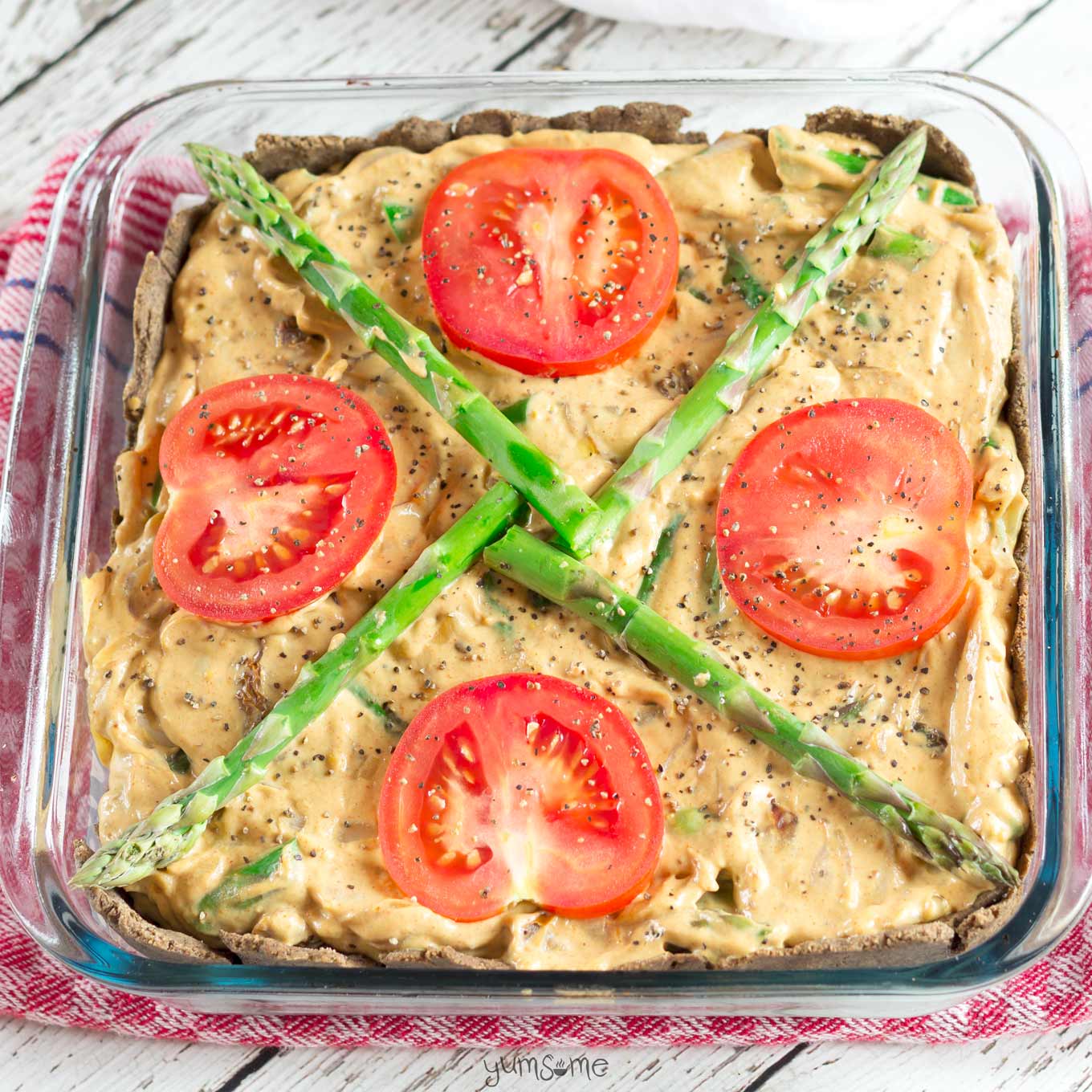 Savoury, filling, and completely delicious gluten-free vegan asparagus and sun-dried tomato quiche. | yumsome.com