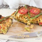 Gluten-free vegan asparagus and sun-dried tomato quiche.