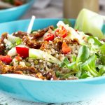 closeup view of a bowl of spicy buckwheat and mungbean salad | yumsome.com
