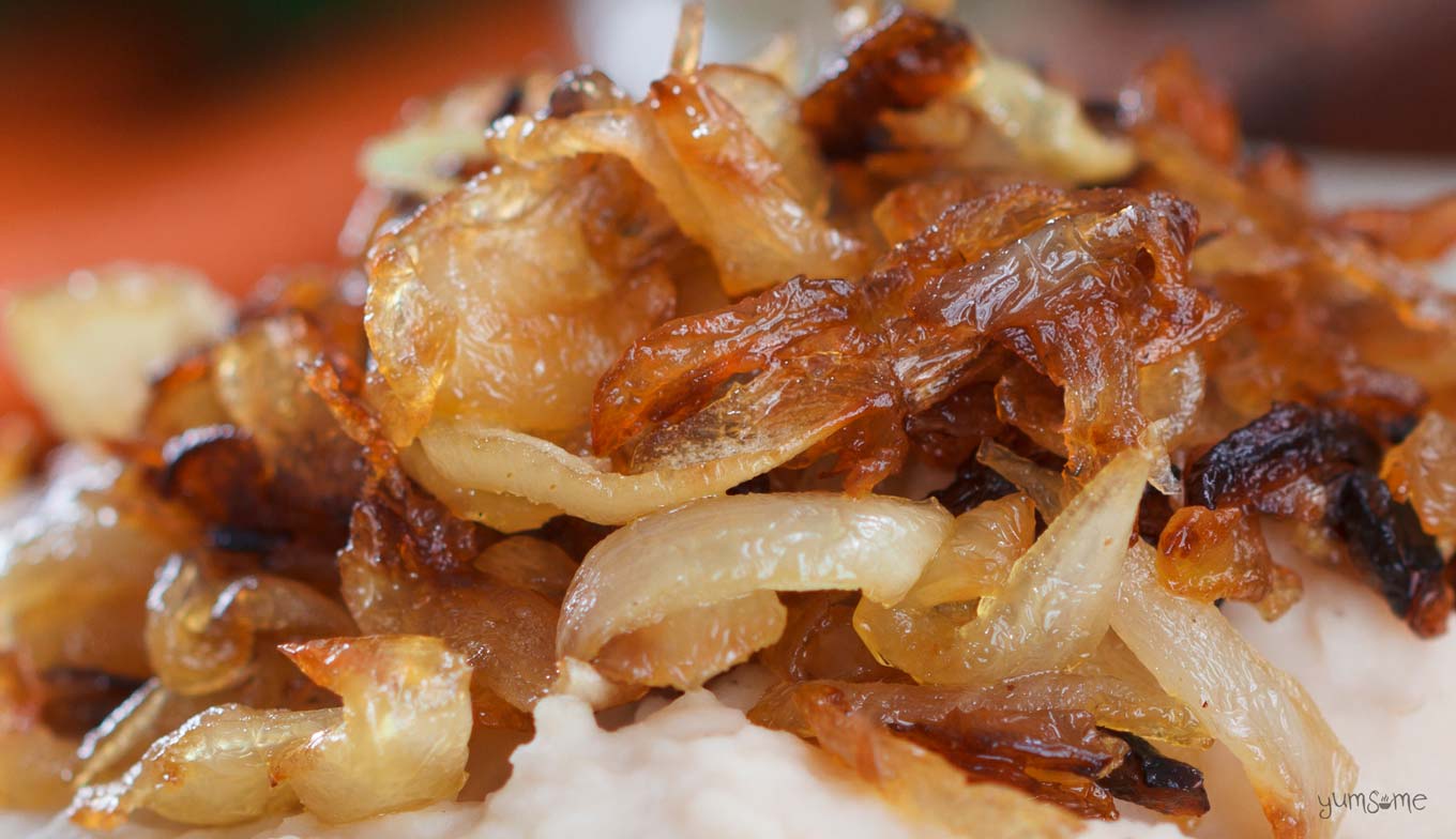 Closeup shot of a pile of caramelised onions.