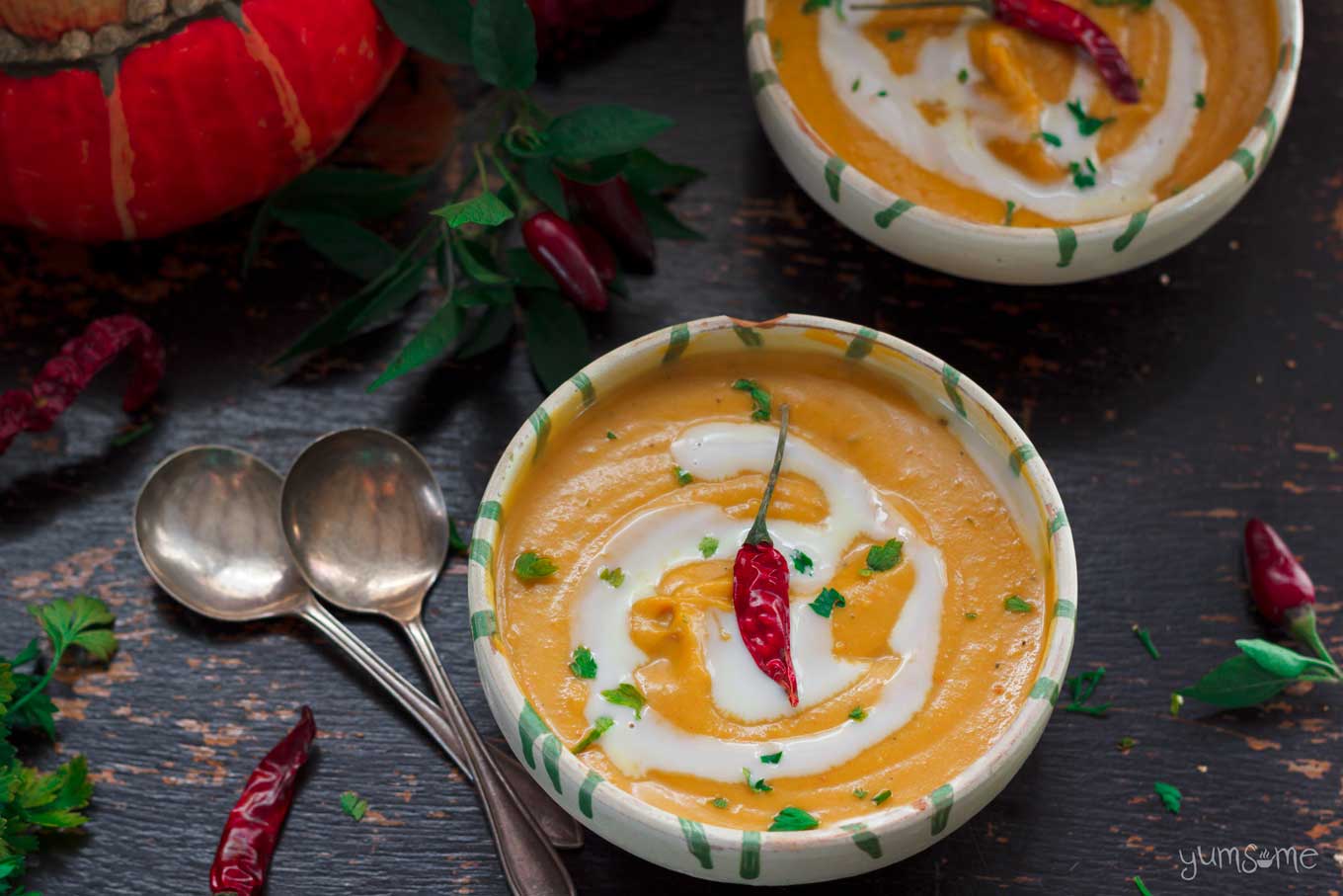 two bowls of Curried Coconut Butternut Squash Soup | yumsome.com