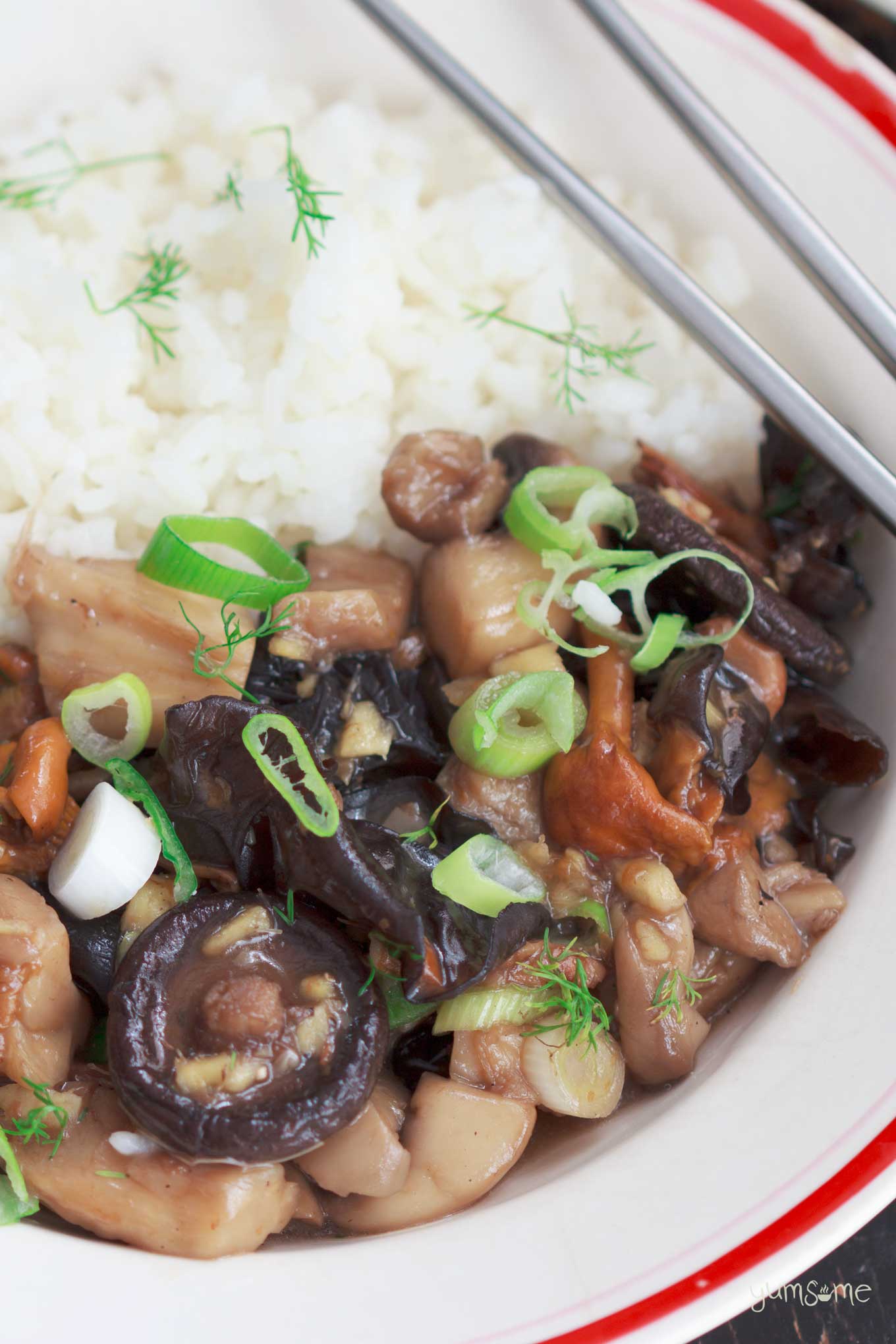 a bowl of asian-style mushrooms with ginger | yumsome.com