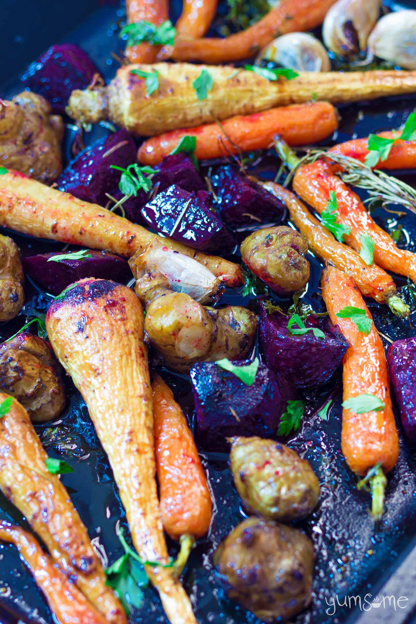 a tray of maple roasted root vegetables yumsome.com