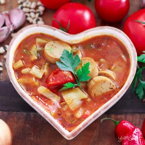 vegan sausage, fennel, and bean casserole in a heart-shaped bowl | yumsome.com