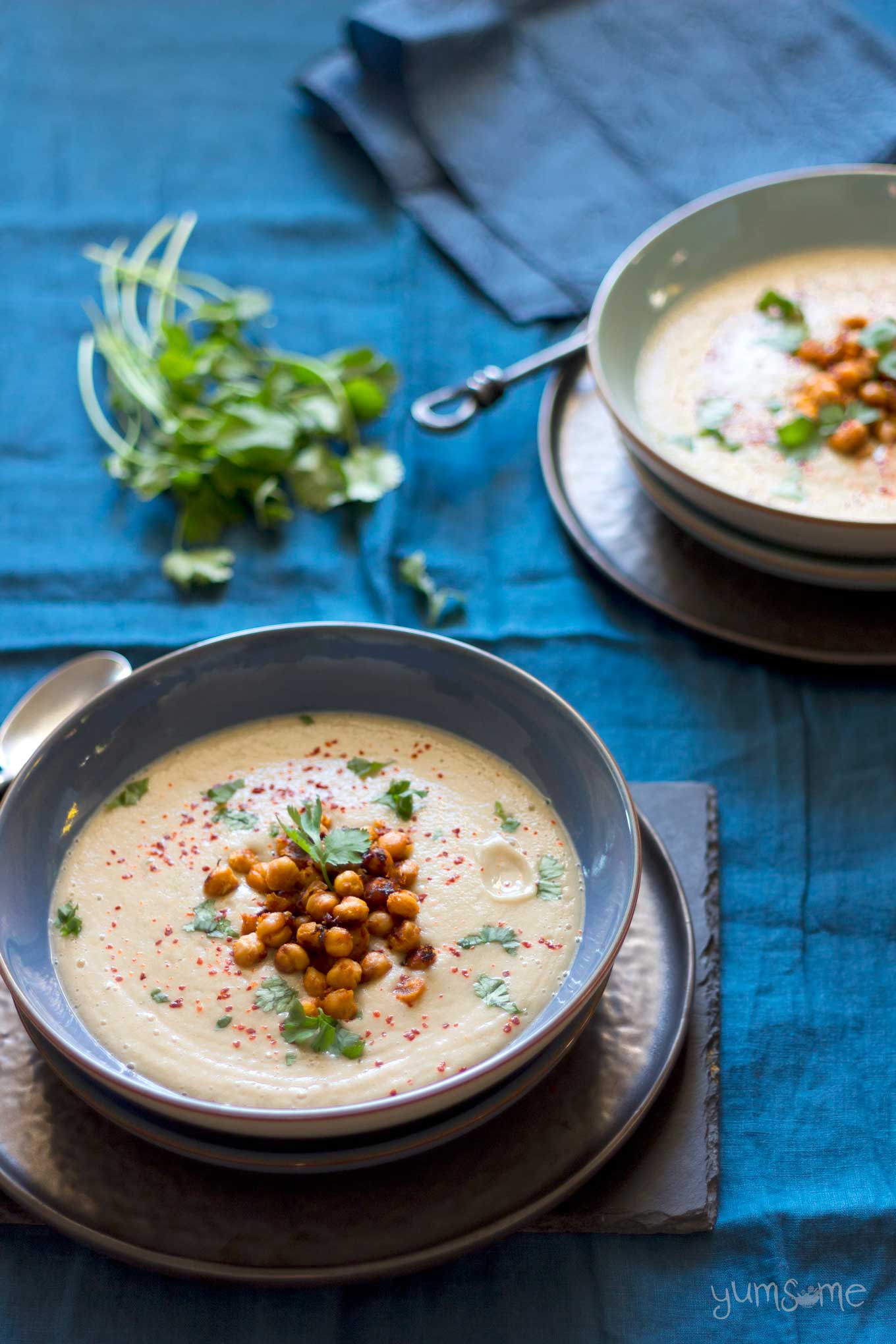 two bowls of Gingery Parsnip Soup with Spicy Roasted Chickpeas | yumsome.com