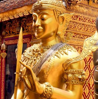 Golden karana mudra Bodhisattva at Wat Phra That Doi Suthep.