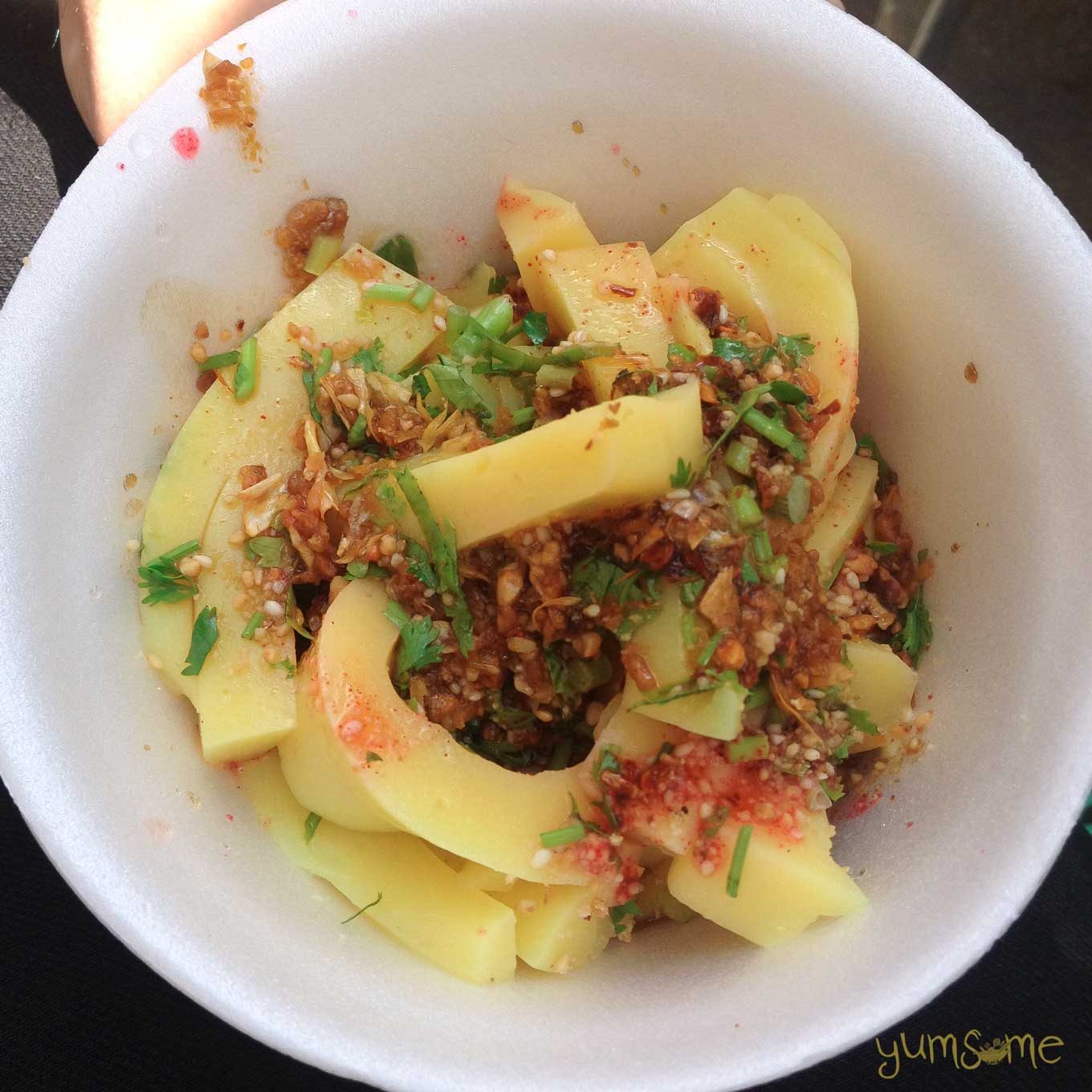 A white bowl containing Burmese tofu salad.