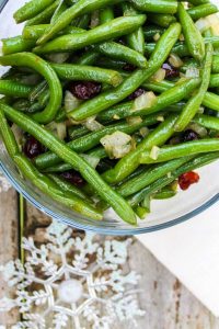 Cooked green beans in a bowl.