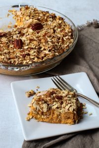 Vegan sweet potato casserole with granola topping.