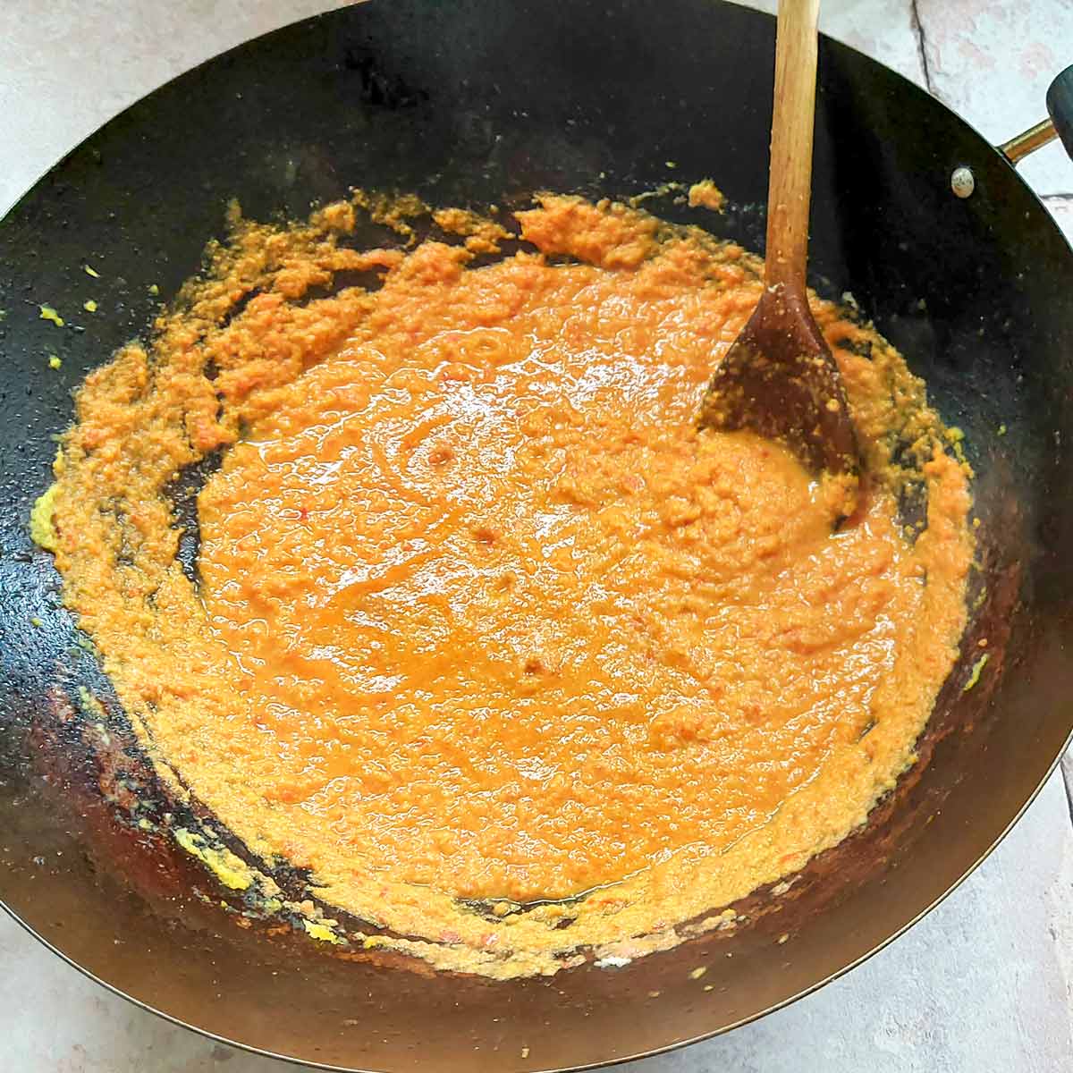 Oil rising to the surface of masala.