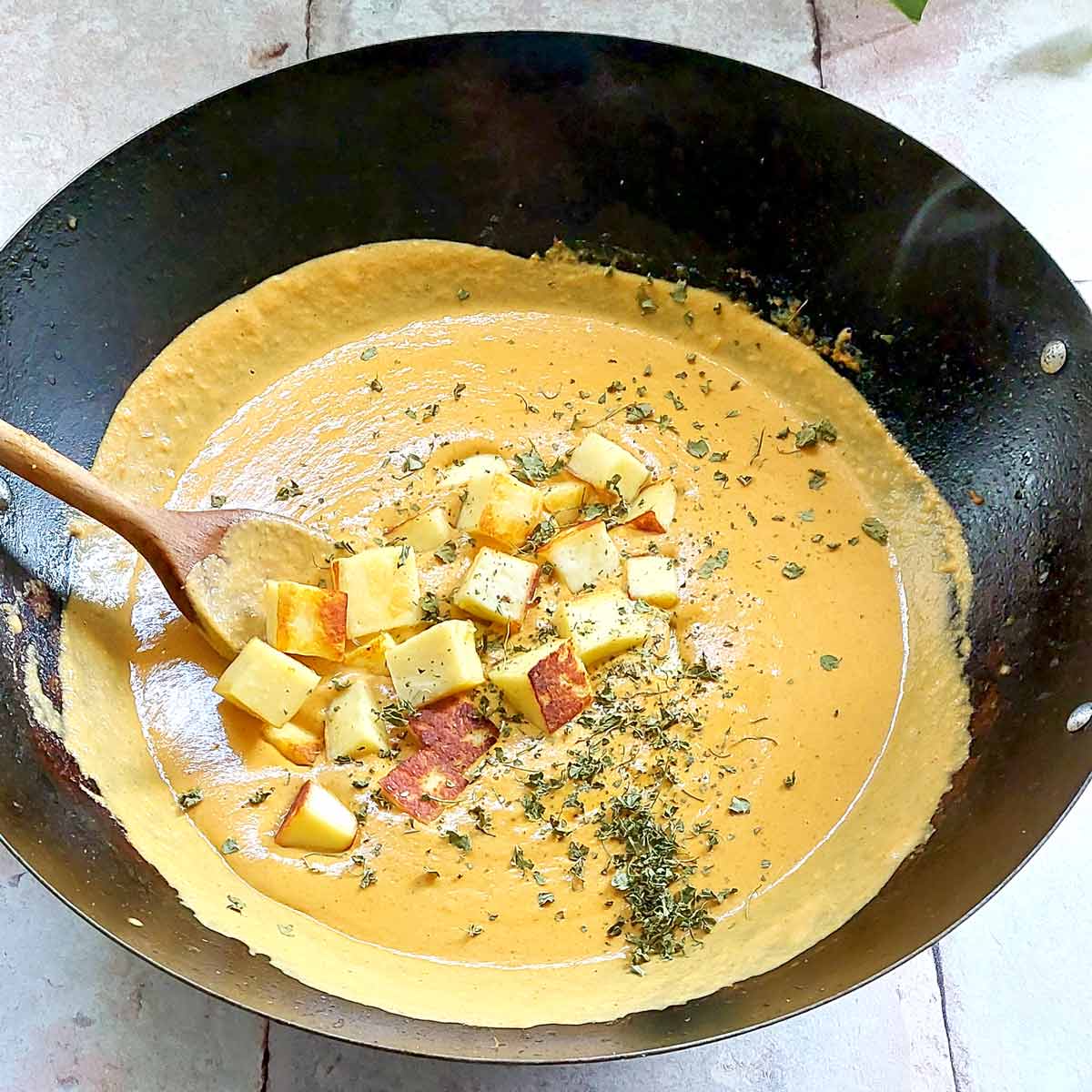 Paneer added to gravy.